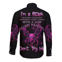 Black long-sleeve button shirt with purple back graphic and central skull design