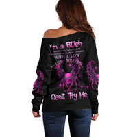 Women's off-shoulder sweater, black with purple back graphic and text