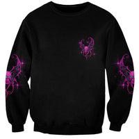 Black crewneck sweatshirt with small purple skull-wing emblem and side scroll graphics