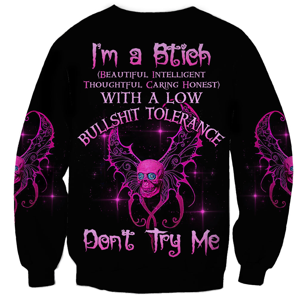 Black crewneck sweatshirt with purple gothic text and winged skull graphic on back
