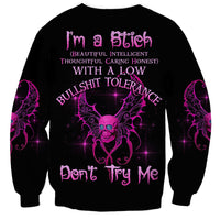 Black crewneck sweatshirt with purple gothic text and winged skull graphic on back