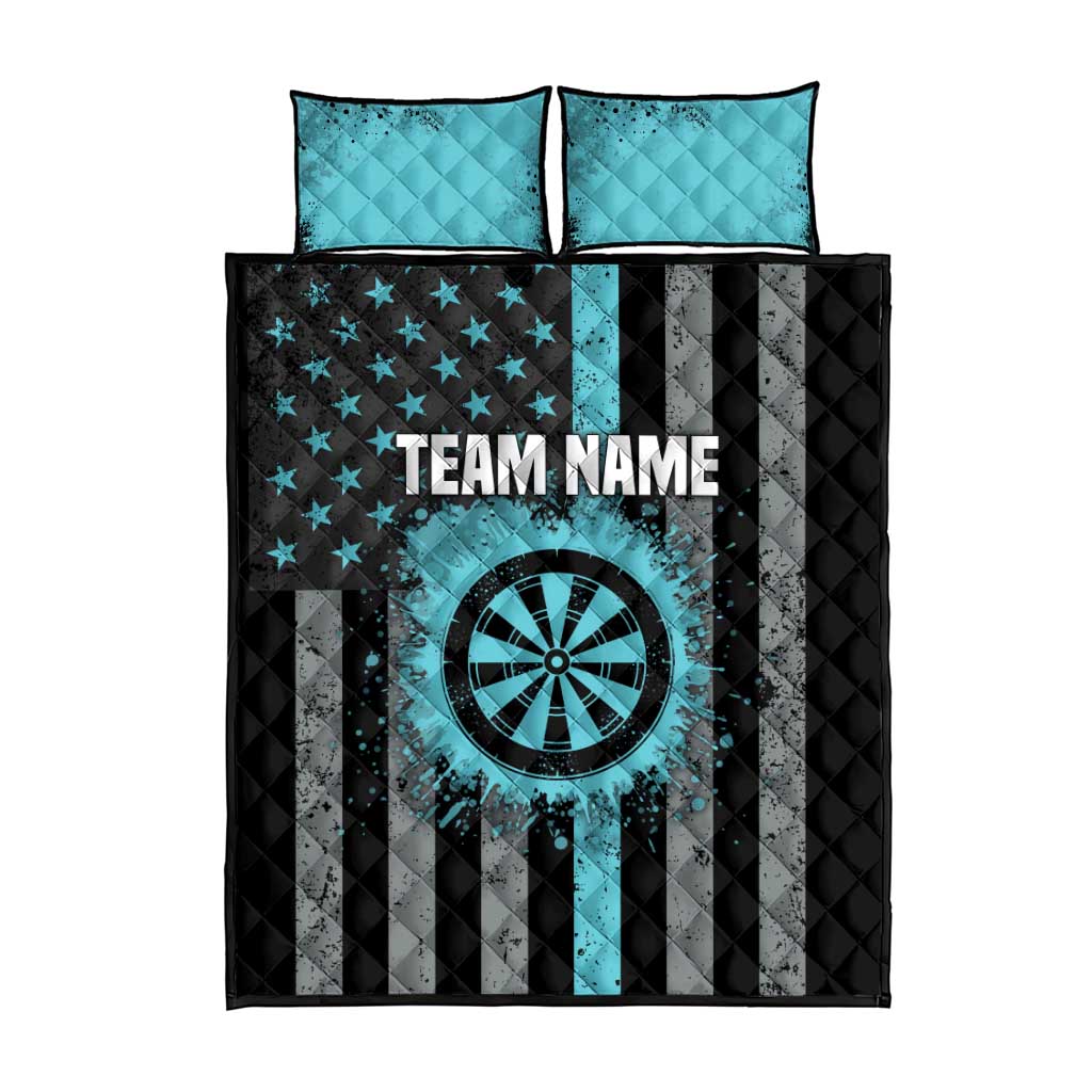 Quilt bed set with teal pillowcases; black quilt has star stripes, target icon, TEAM NAME