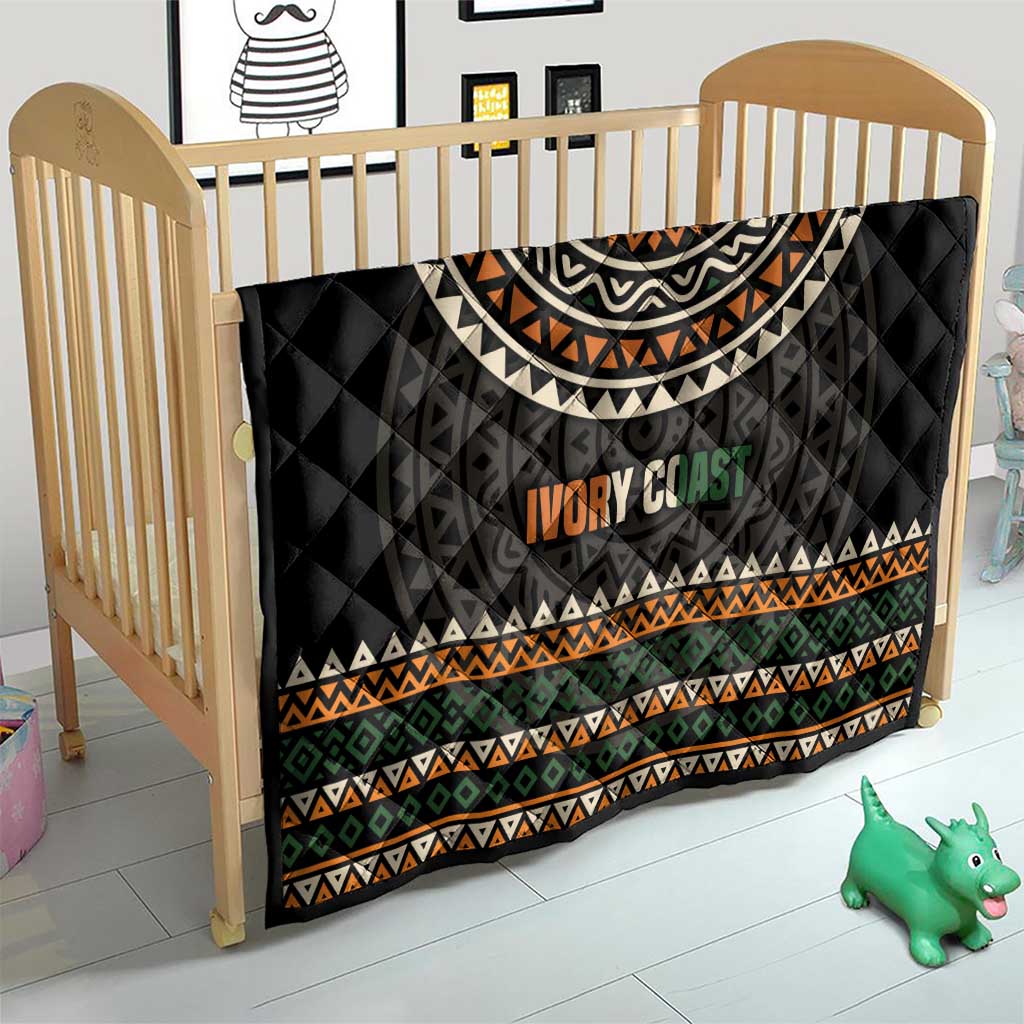 Black quilt for baby bed with geometric arc motif, multicolor border, “Ivory Coast”