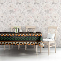 Ivory Coast tablecloth with black geometric pattern in orange, green, and teal