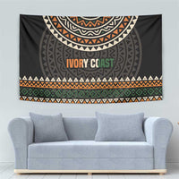 Ivory Coast tapestry with black-and-gray geometric patterns, orange “IVORY COAST” text strip