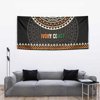 Ivory Coast tapestry with bold geometric bands, orange “IVORY COAST” motto and green accents