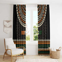 Black window curtains with multicolor geometric bands and 'IVORY COAST' lettering