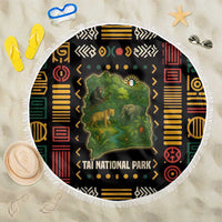 Round beach blanket with Taï National Park wildlife map design and fringe