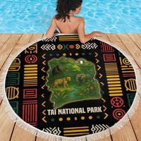 Round beach blanket with Taï National Park wildlife map design and fringe