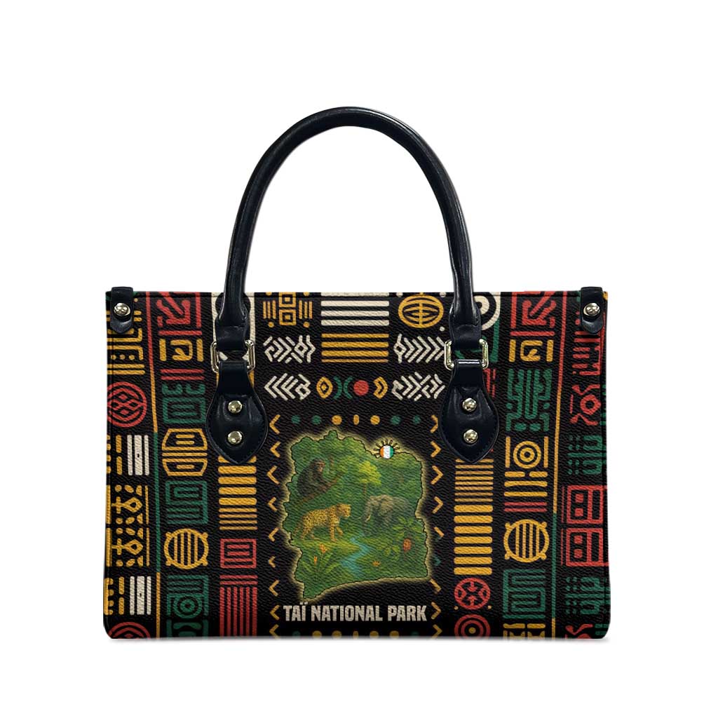 Multicolor wildlife map handbag with black top handles and metal snap accents