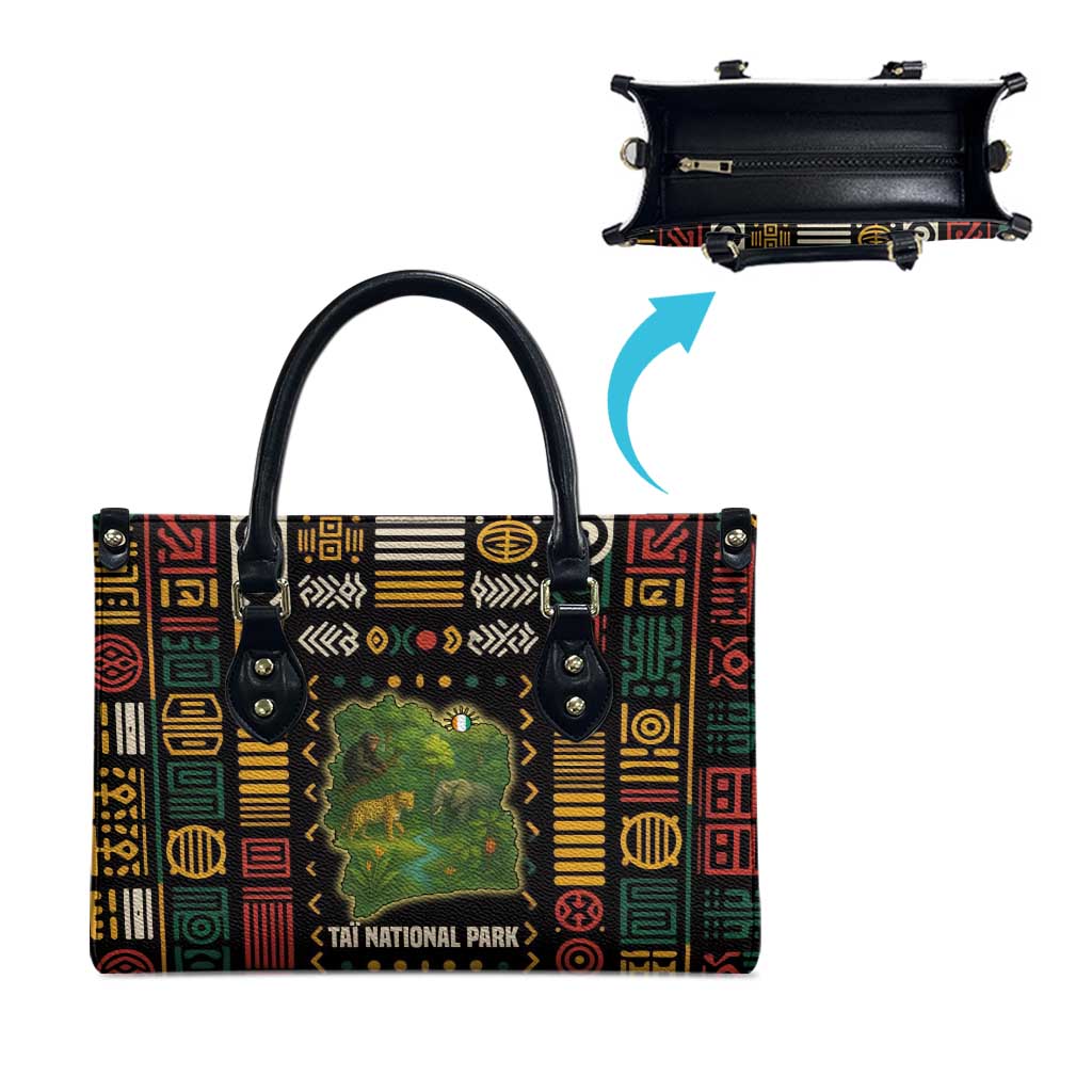 Wildlife map handbag with zipper top closure, black trim, and black top handles