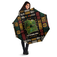Umbrella with Taï National Park wildlife map design and multicolor geometric pattern