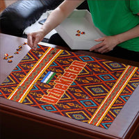 Multicolor jigsaw puzzle with Uzbek geometric design, pieces placed on the board