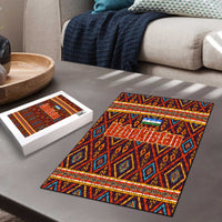 Multicolor jigsaw puzzle with Uzbek geometric motif, laid out with puzzle box nearby