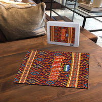 Multicolor jigsaw puzzle with Uzbek geometric motif, scattered pieces and boxed set