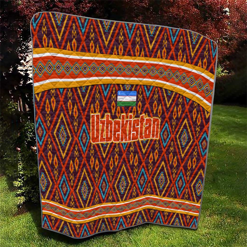 Multicolor Uzbekistan quilt with geometric diamond pattern and orange striped borders