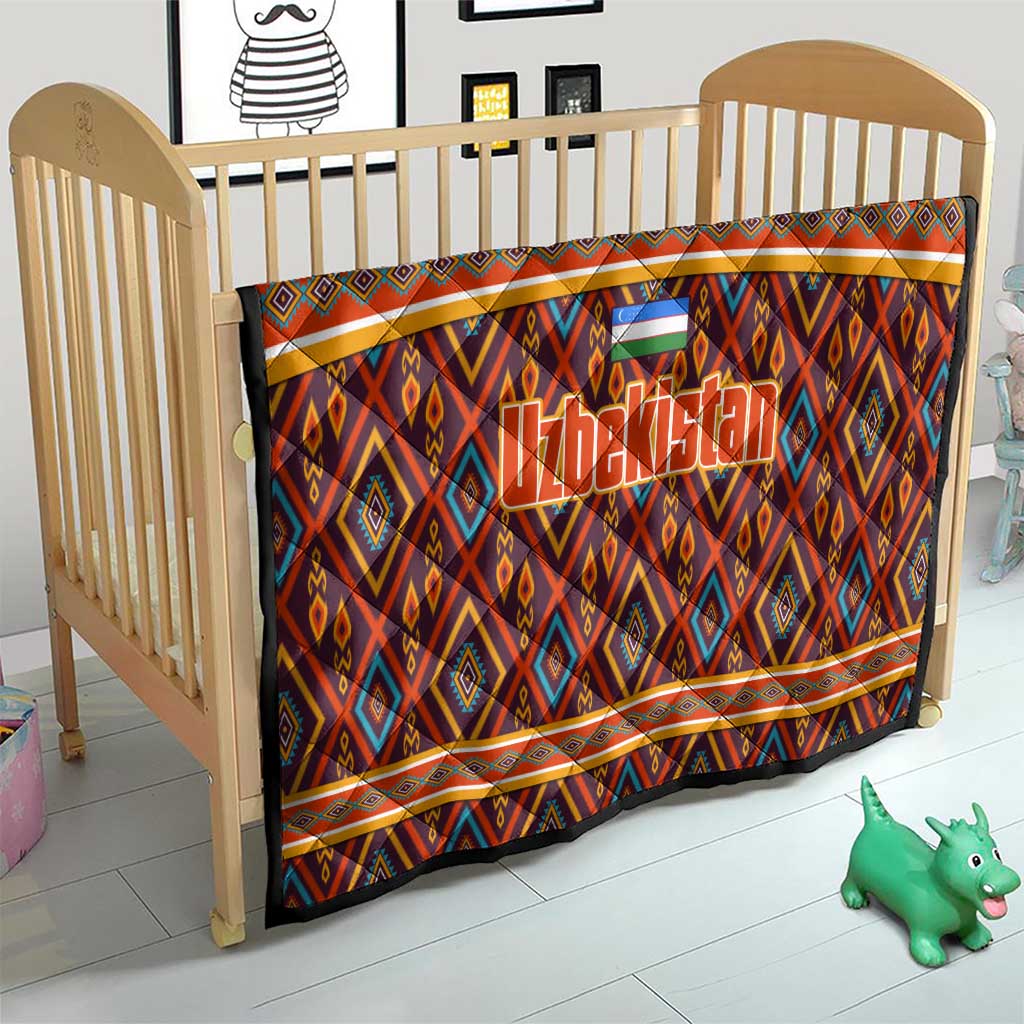 Multicolor Uzbekistan quilt on baby crib, with diamond motifs and flag emblem