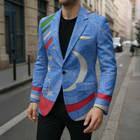 Blue single-breasted unisex blazer with crescent-moon stars graphic and striped sleeve bands.
