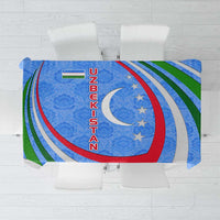 Uzbekistan tablecloth with blue crescent, stars, and multicolor swirl stripes design