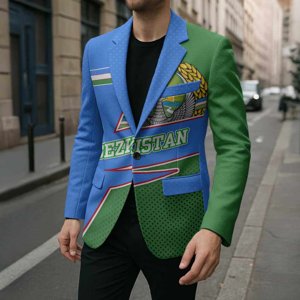 Multicolor blazer worn with dark shirt, crest artwork on chest, green and blue sleeves