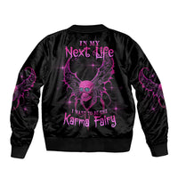 Black bomber jacket with purple graphic on back and ribbed knit collar and cuffs