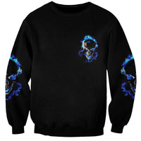 Black unisex sweatshirt with small blue skull fire print on chest and sleeves