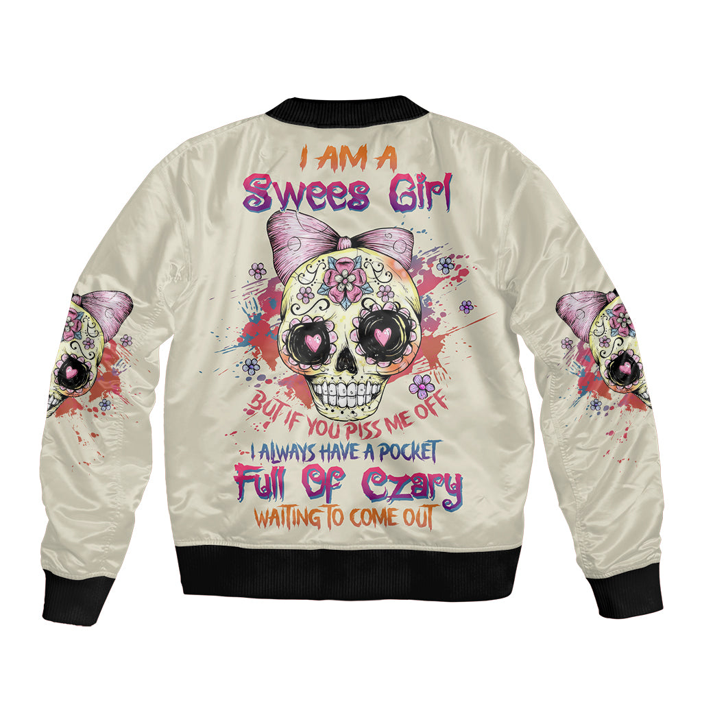 Cream bomber jacket with colorful skull-girl graphic on back, ribbed cuffs and hem