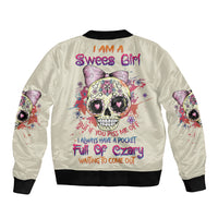 Cream bomber jacket with colorful skull-girl graphic on back, ribbed cuffs and hem