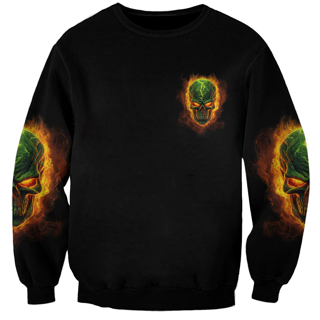 Unisex black sweatshirt with small centered skull graphic and green flame sleeve print