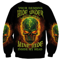 Unisex black sweatshirt with green-orange skull graphic, flame sleeves, crewneck