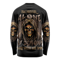 Black long-sleeve shirt with reaper skull graphic and gold text on back