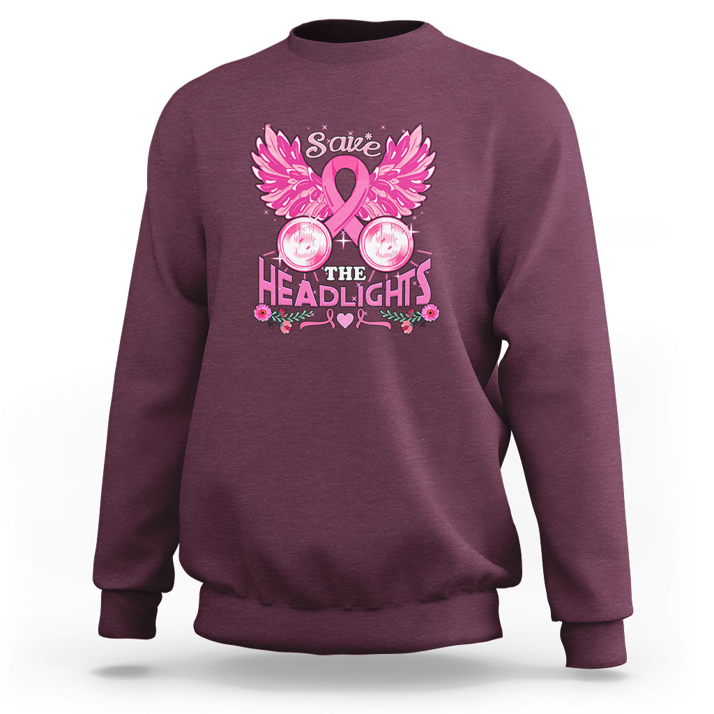 Maroon crewneck sweatshirt with pink ribbon, wings, and “Save the Headlights” graphic