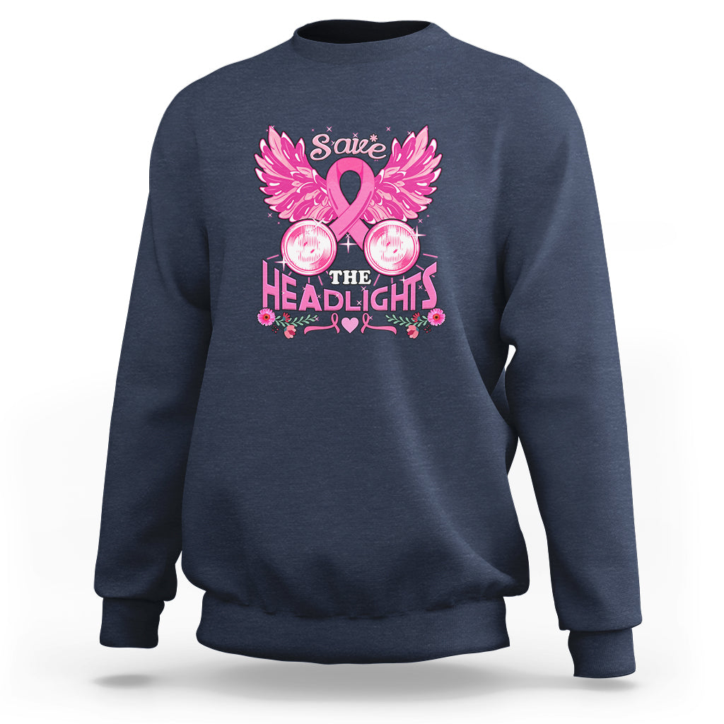 Navy crewneck sweatshirt with pink ribbon, wings, and “Save the Headlights” graphic