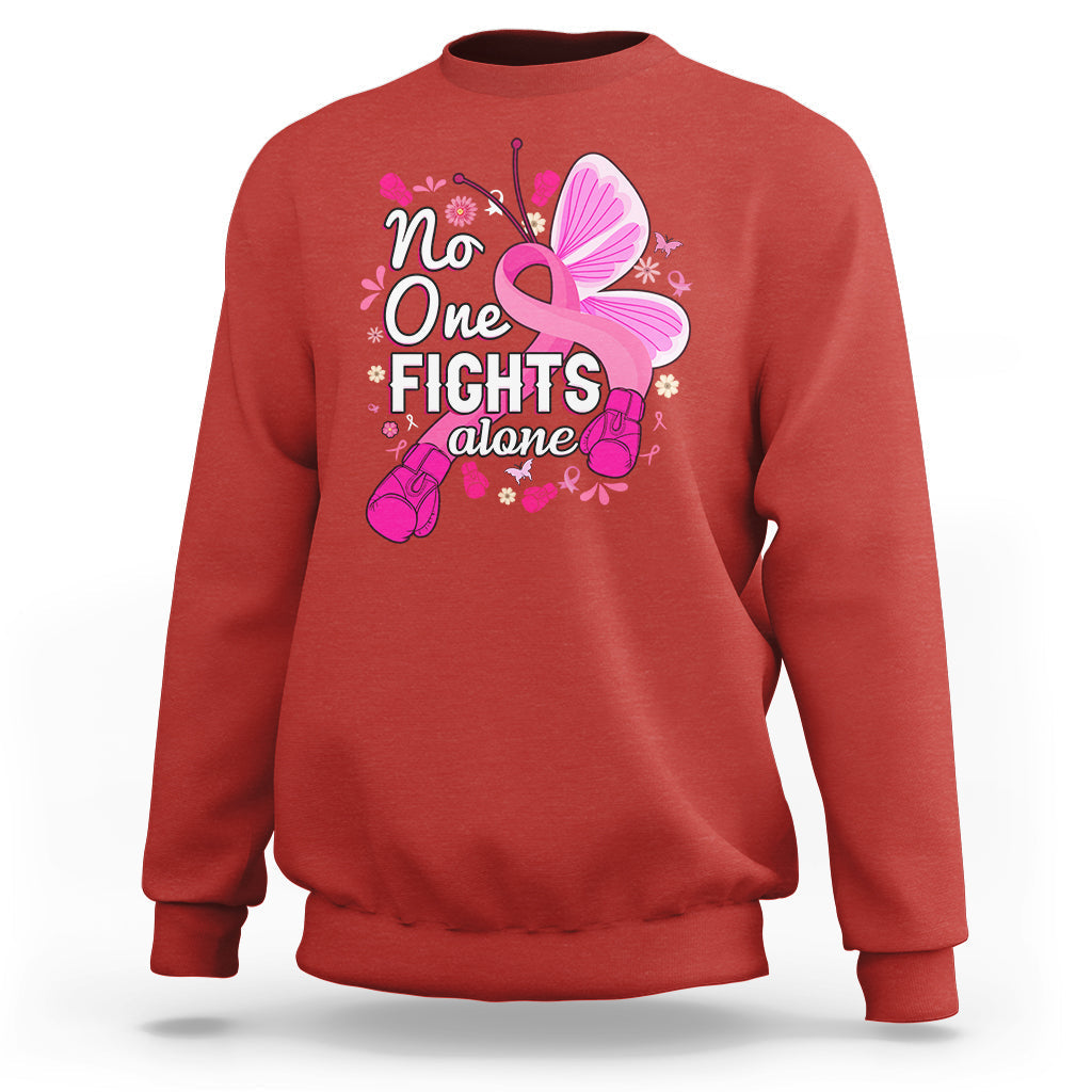 Red breast cancer awareness sweatshirt with pink ribbon butterfly “No One Fights alone”.