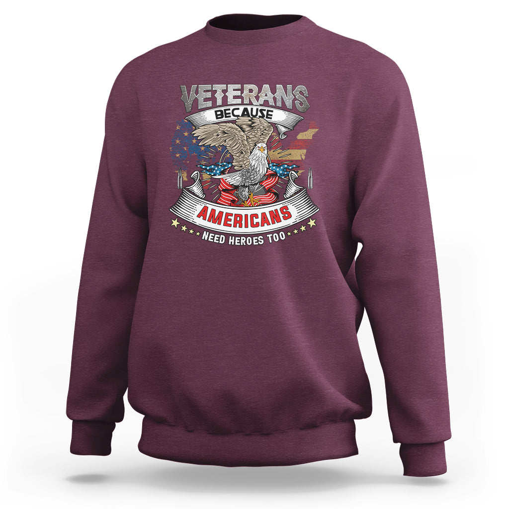 Maroon sweatshirt with eagle Veterans graphic and Americans need heroes print