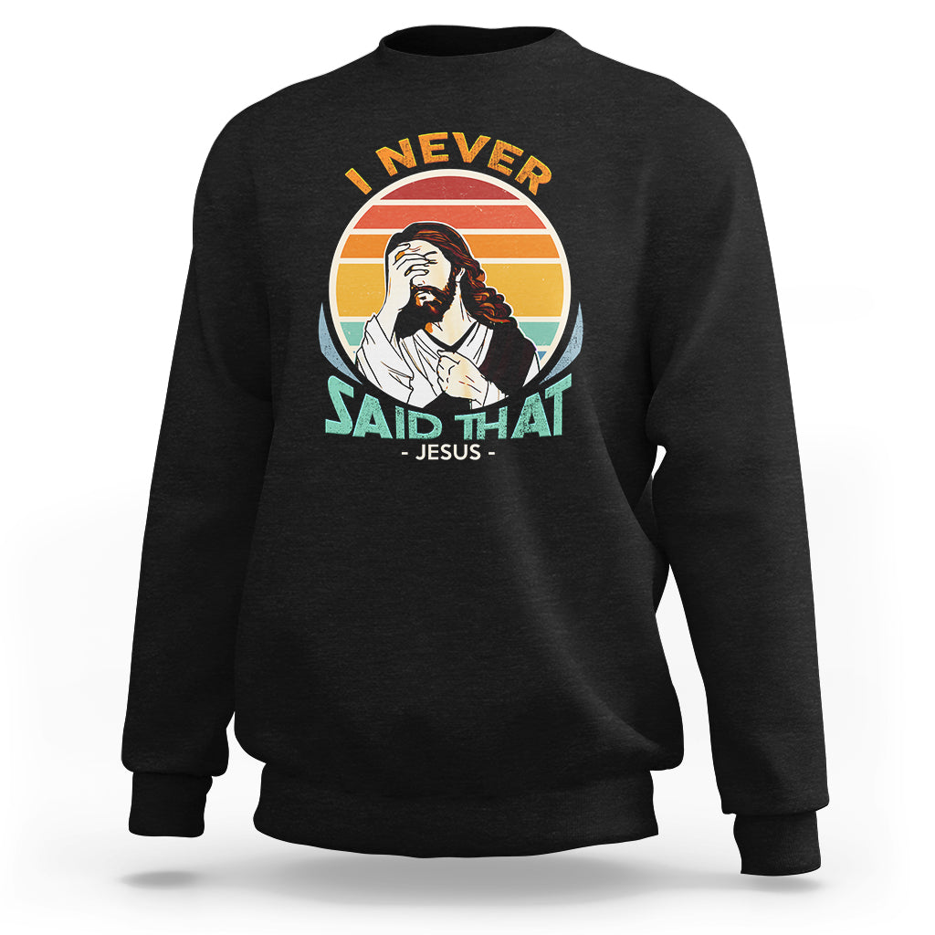 Black crewneck sweatshirt with circular Jesus graphic and text on front.