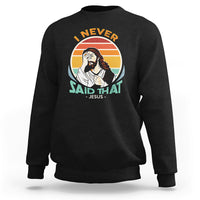 Black crewneck sweatshirt with circular Jesus graphic and text on front.