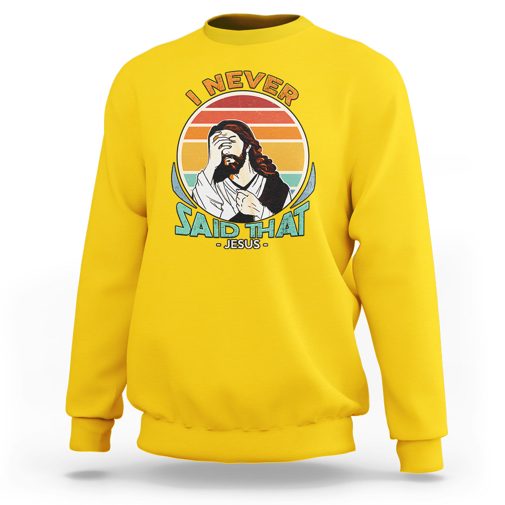 Daisy yellow crewneck sweatshirt with circular Jesus graphic and text on front.