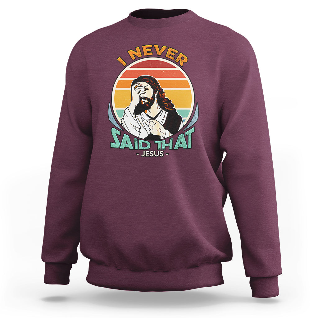 Maroon crewneck sweatshirt with circular Jesus graphic and text on front.