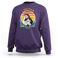 Purple crewneck sweatshirt with circular Jesus graphic and text on front.