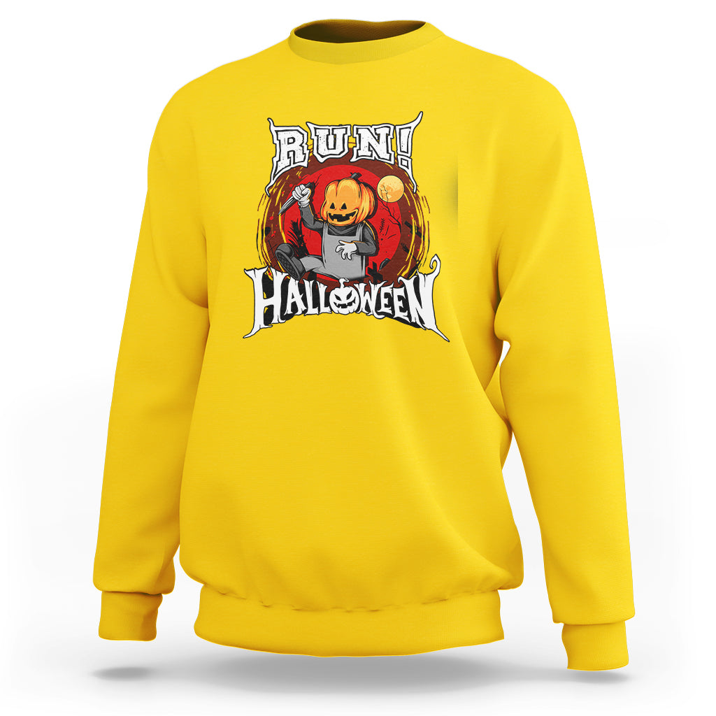 Daisy yellow Halloween graphic sweatshirt with front 'RUN! HALLOWEEN' pumpkin rider print