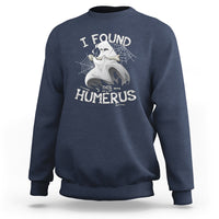 Navy sweatshirt with front “I FOUND THIS HUMERUS” skeleton and spiderweb graphic