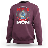 Maroon crewneck sweatshirt with nurse graphic and 'CALL ME MOM' text