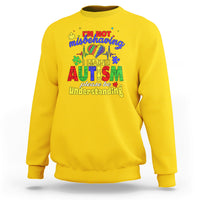 Yellow autism mom sweatshirt with colorful front text graphic, “I’m not misbehaving”