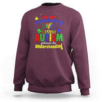 Maroon autism mom sweatshirt with colorful front text graphic, “I’m not misbehaving”