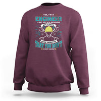 Maroon crewneck sweatshirt with engineer graphic and text on the chest