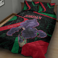 Black quilt bed set with Jordan word across top, purple figure, red and green geometric