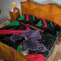 Black quilt bed set with Jordan lettering, large purple figure, red and green diagonal shapes