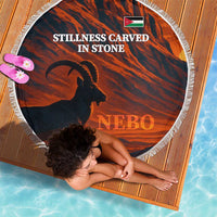Round beach blanket with fringe, red desert pattern, horse silhouette and NEBO text