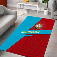 Color-block area rug with centered Azerbaijan crest, blue field, and red pattern